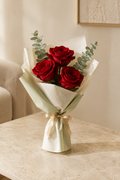 Minimalist three red rose hand tied bouquet